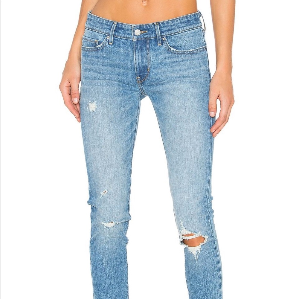 Levi’s mid rise distressed skinny jeans